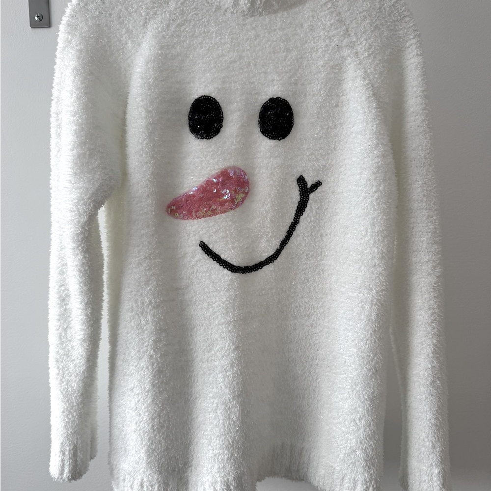 Super cute women’s fuzzy snowman sweater. Has sequence face.